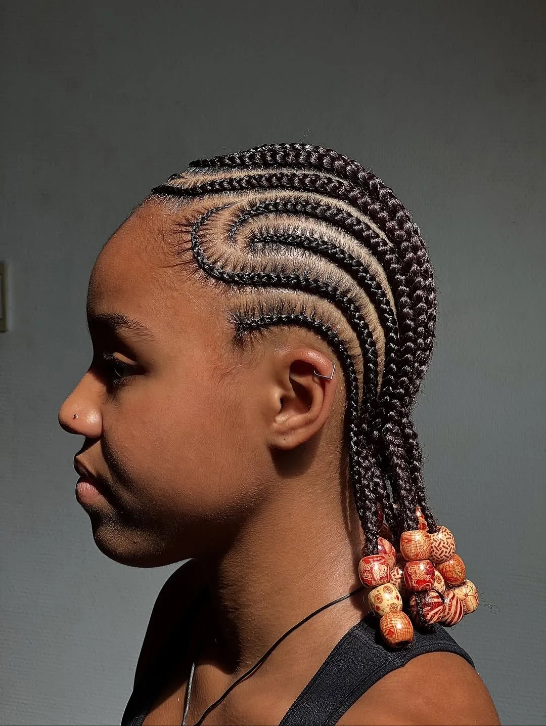 Curved Cornrows With Beaded Ends