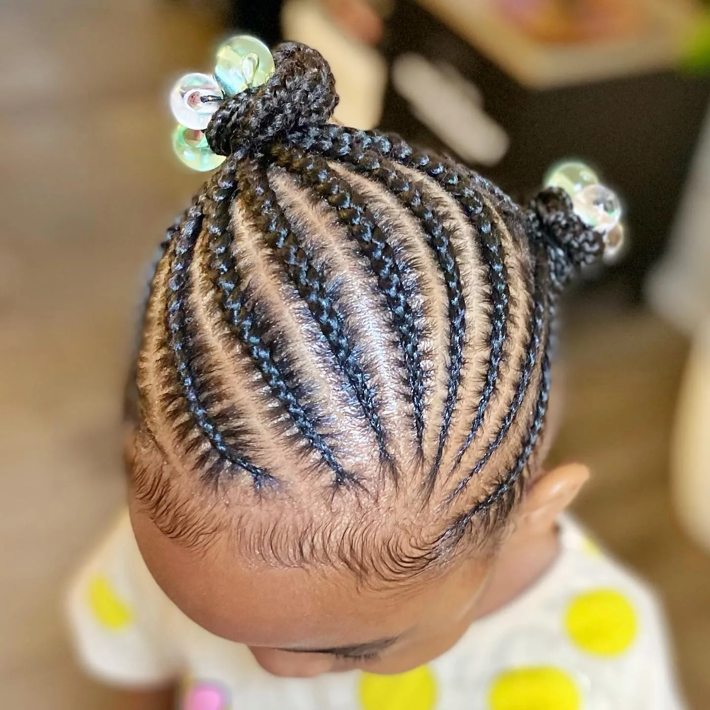 Curved Cornrows With Double Buns