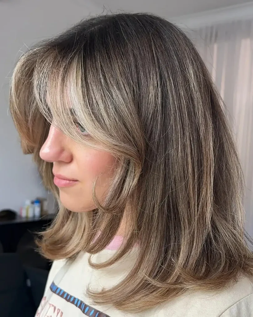 Feathered Blonde Long Bob