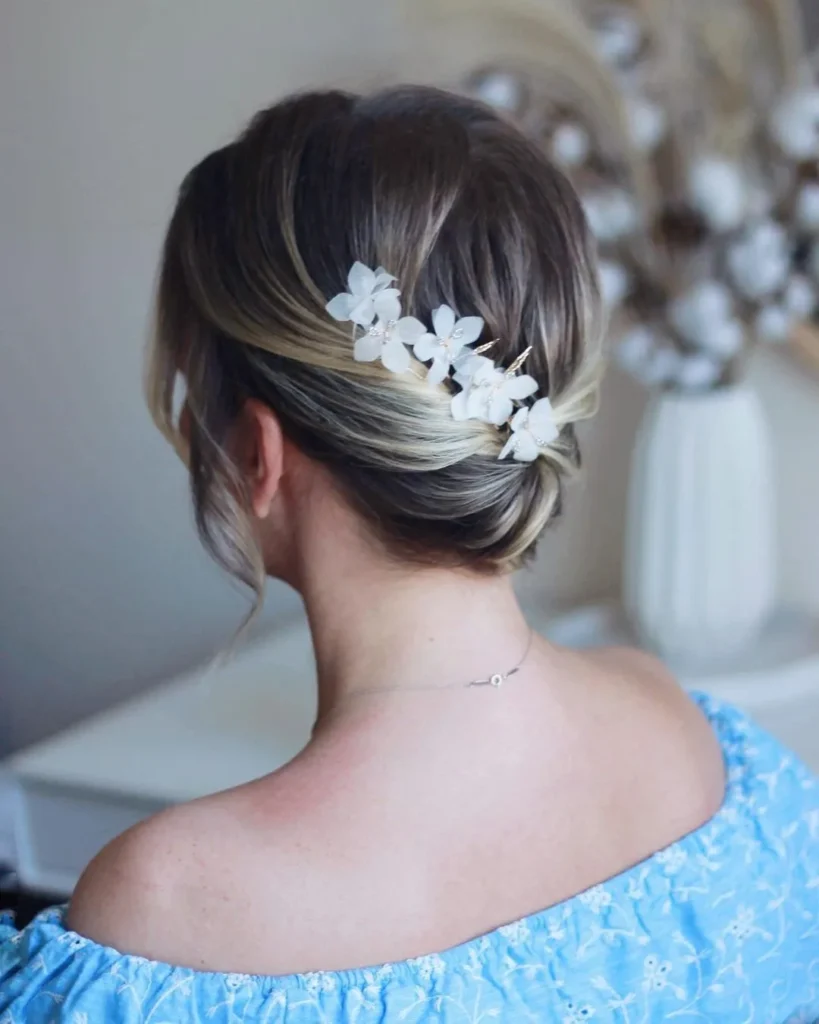 Floral Tucked Low Bun Updo