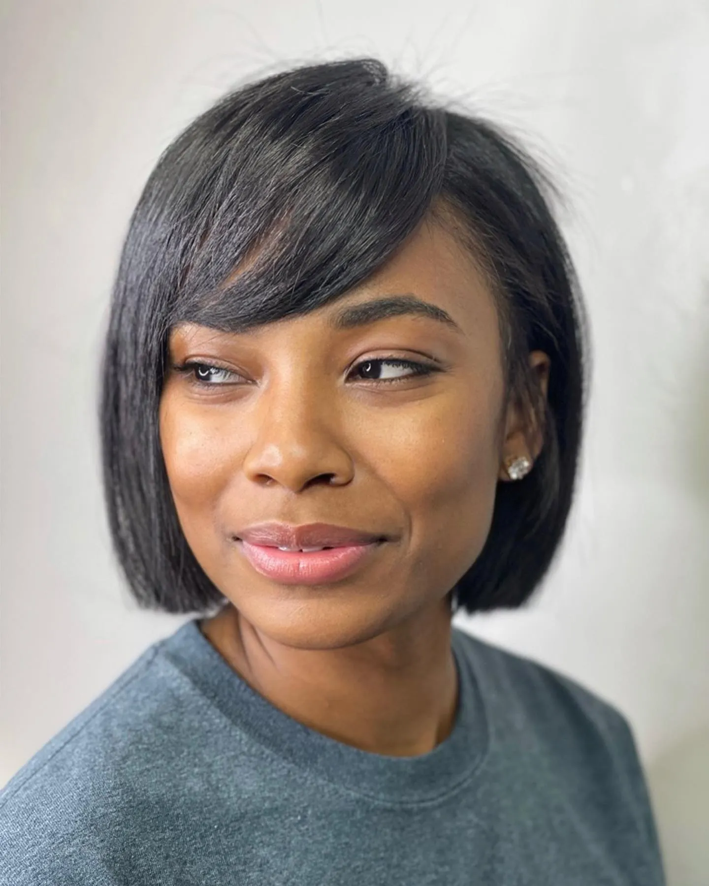 Glossy Angled Bob with Side Fringe