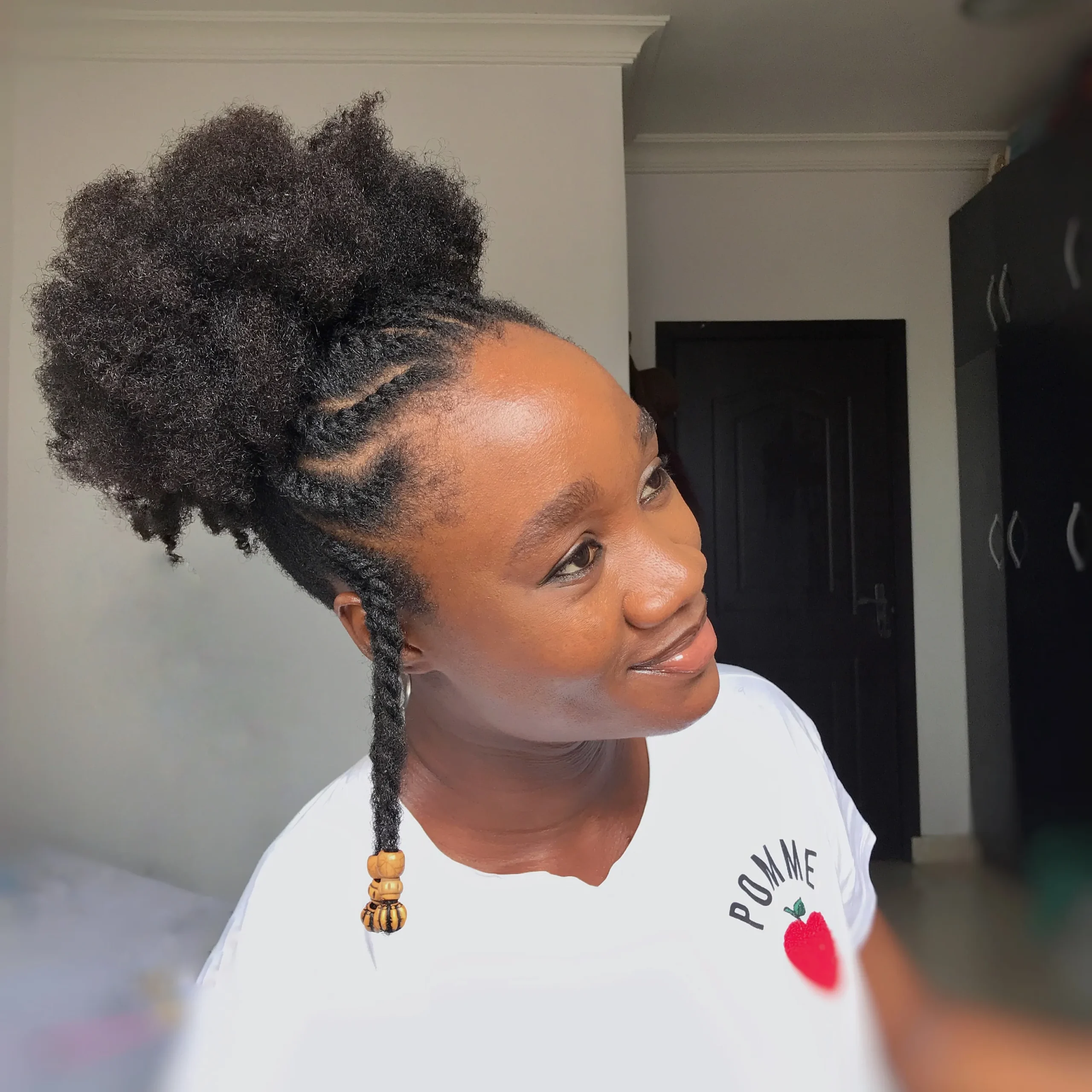 High Afro Puff With Beaded Braid