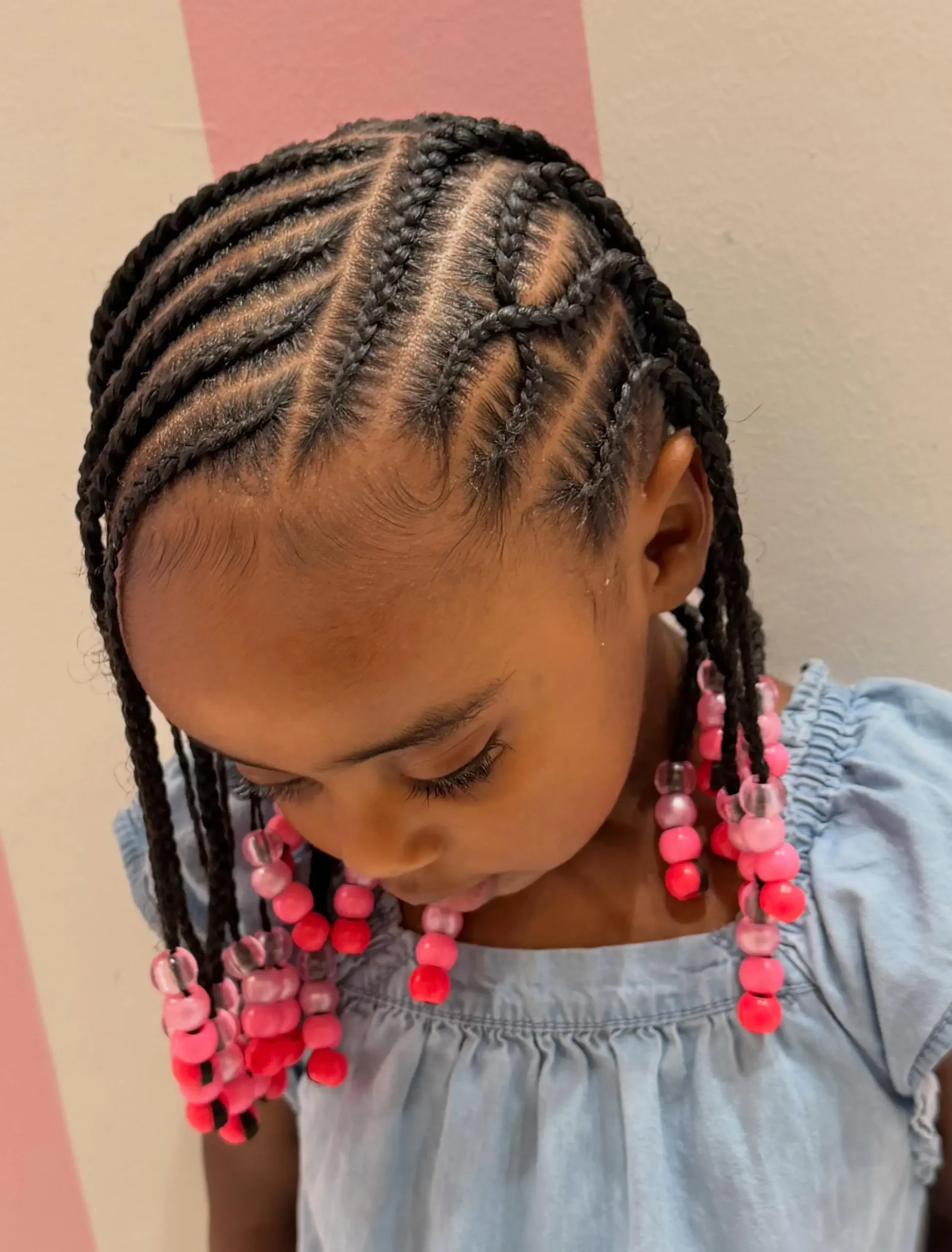 Pink Beaded Side Part Cornrows