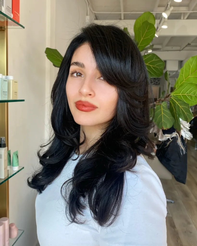 Rounded voluminous flip bangs