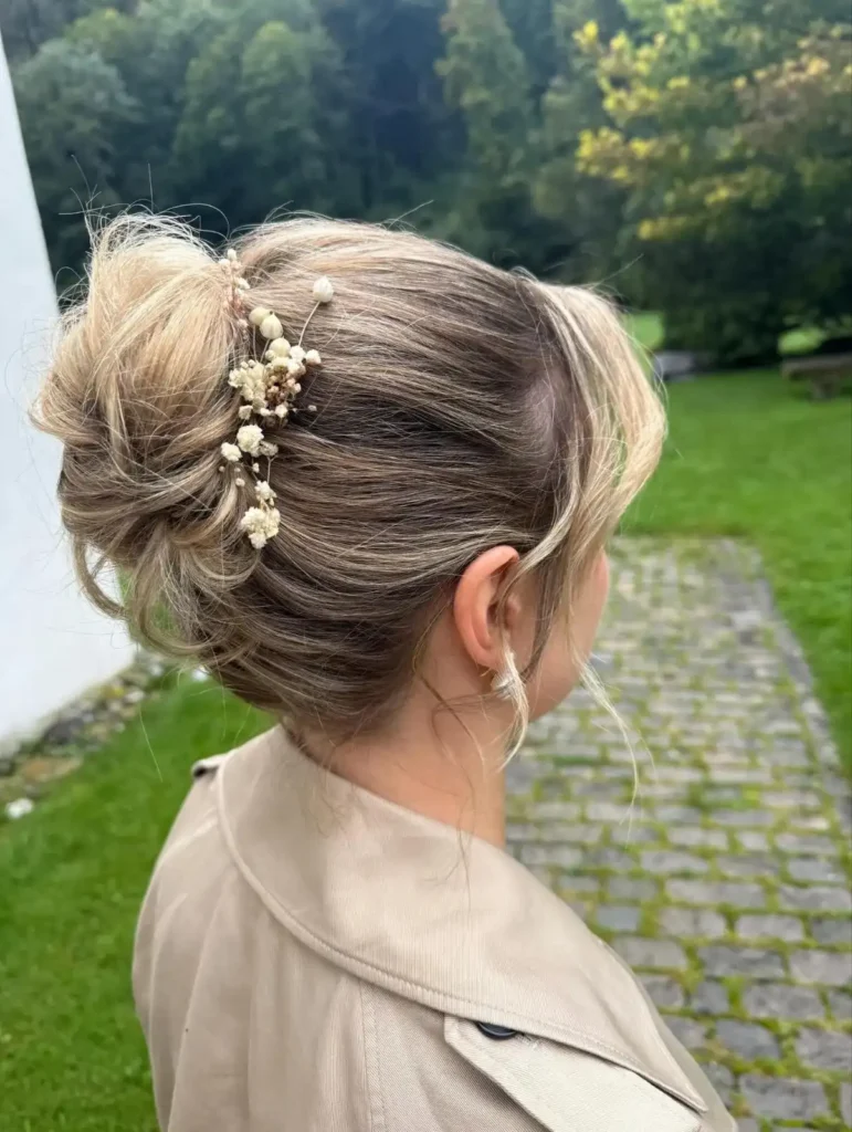 Rustic Messy Bun with Floral Accents