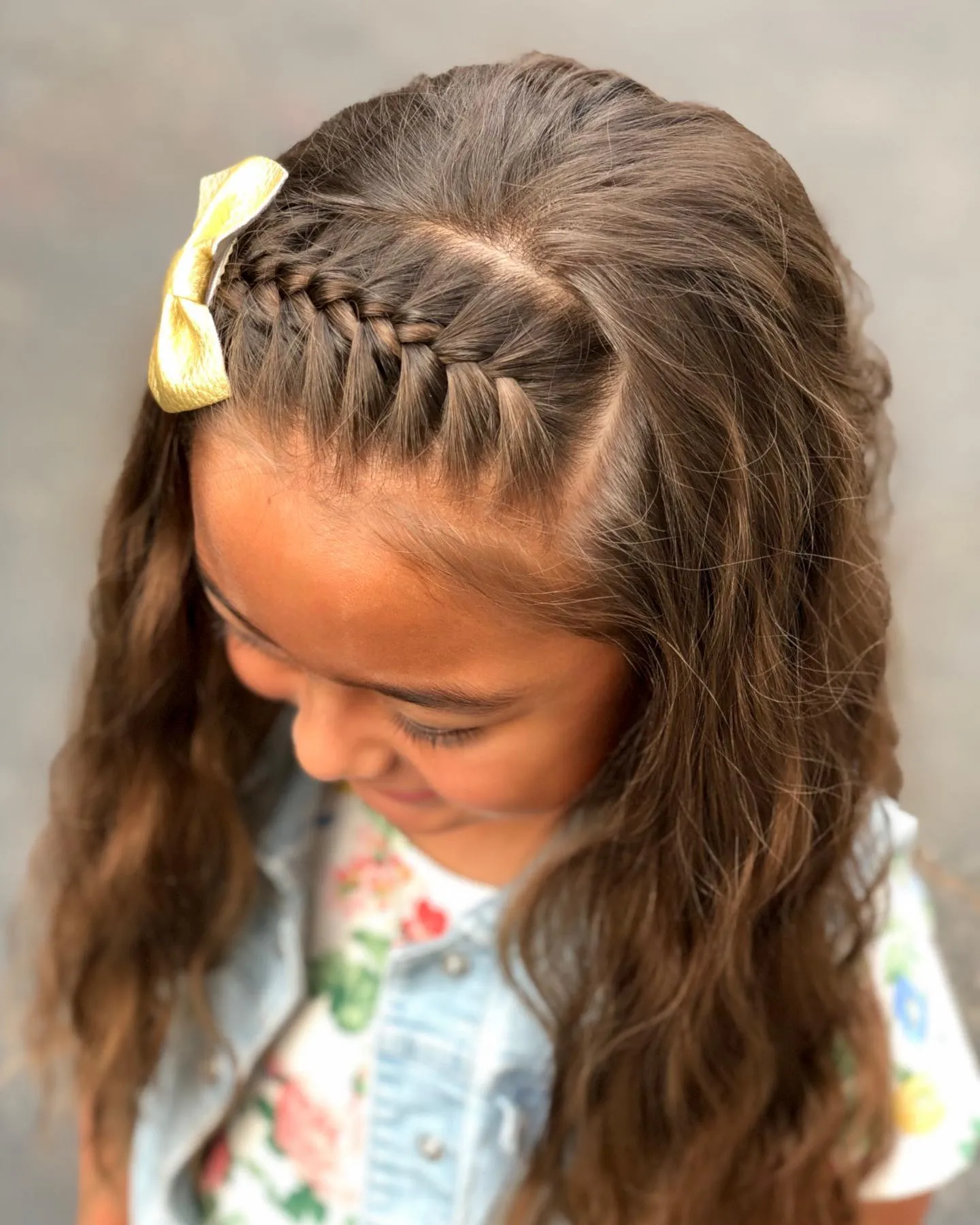 Side Braid With Gold Bow