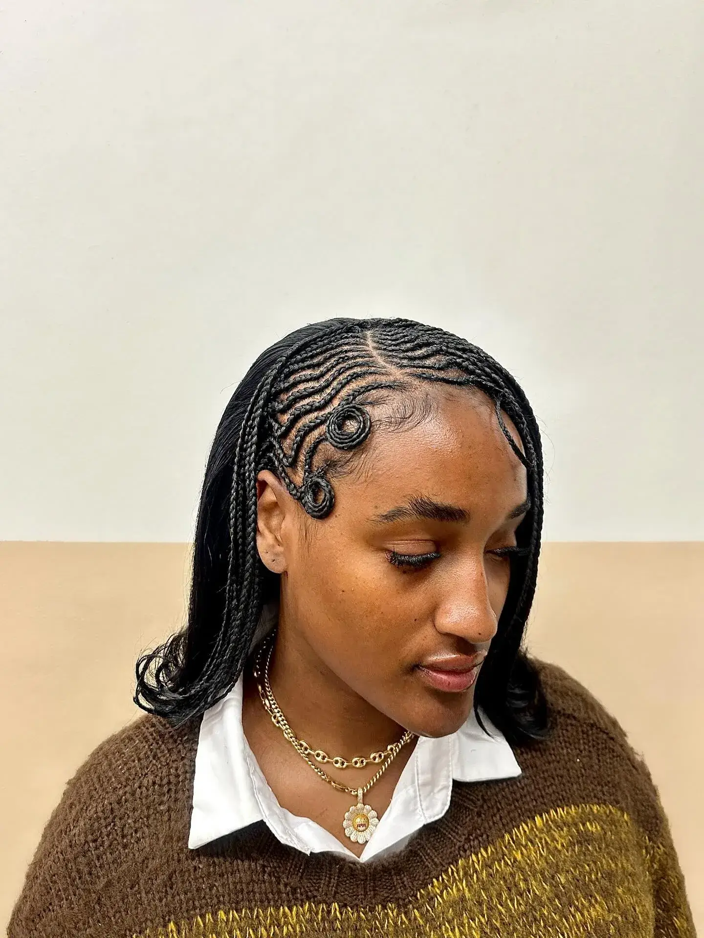 Sleek Swirl Cornrow Bob