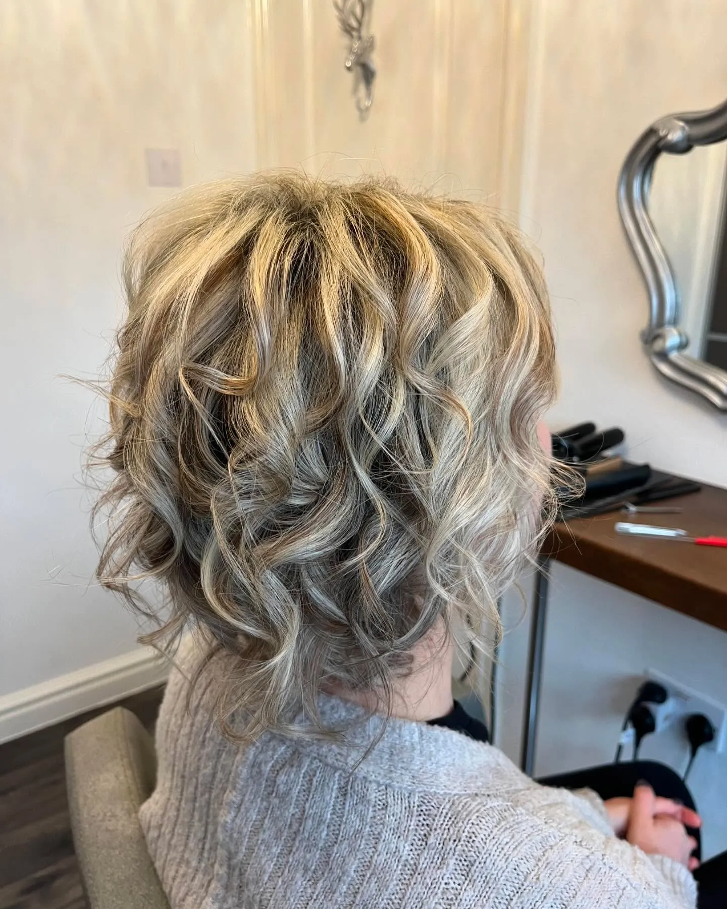 Voluminous Blonde Curly Bob