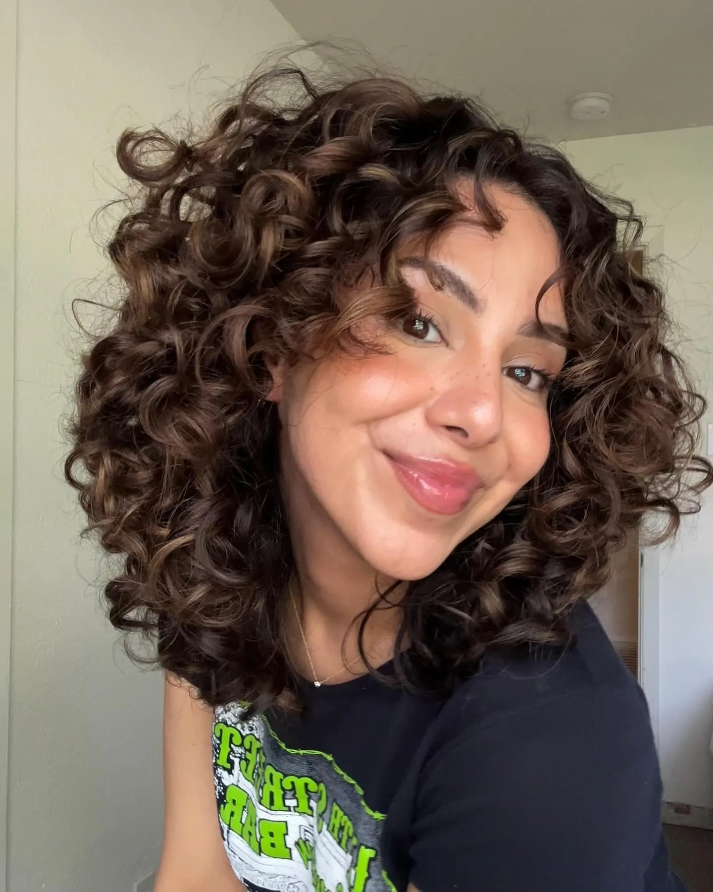 Voluminous Brunette Curly Bob