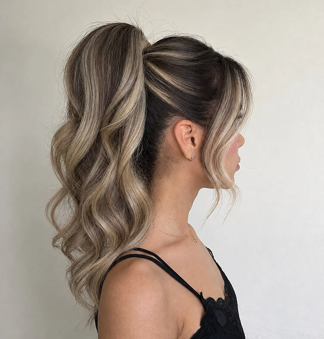 Voluminous Highlighted Party Ponytail